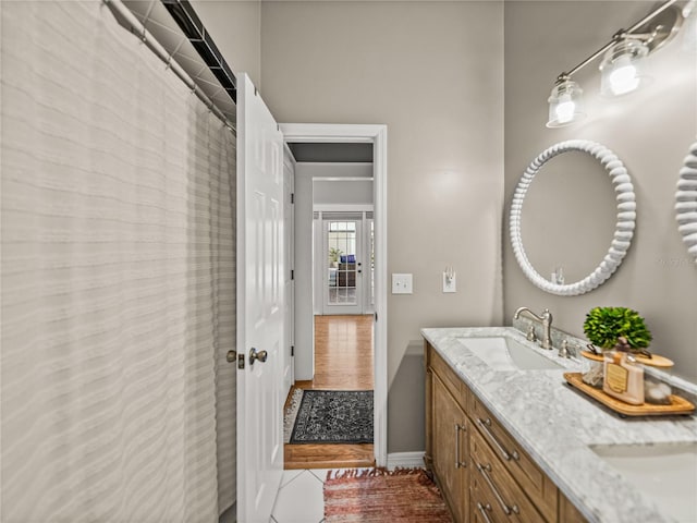 4611 Ackerly Way, Brandon, FL 33511 - bathroom with double vanity and tile patterned flooring