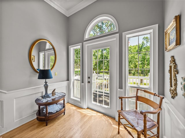 4611 Ackerly Way, Brandon, FL 33511 - entryway featuring crown molding, wainscoting, and wood finished floors
