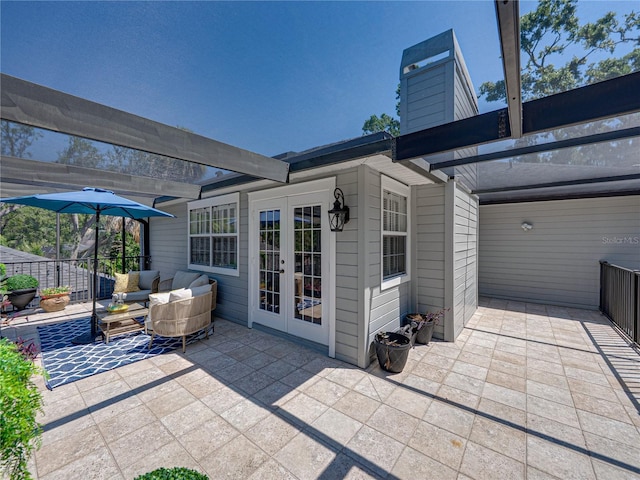 4611 Ackerly Way, Brandon, FL 33511 - view of patio / terrace featuring french doors