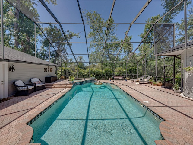 4611 Ackerly Way, Brandon, FL 33511 - view of swimming pool featuring a patio, a pool with connected hot tub, and a lanai