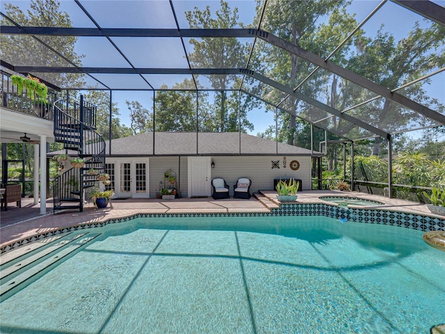 4611 Ackerly Way, Brandon, FL 33511 - view of pool featuring stairway, french doors, a lanai, a patio area, and a pool with connected hot tub