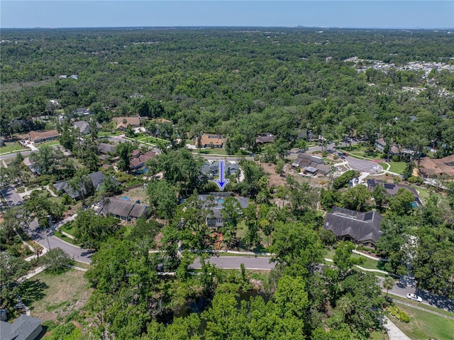 4611 Ackerly Way, Brandon, FL 33511 - aerial overview of property's location featuring a heavily wooded area and nearby suburban area