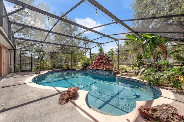 10421 Mesa Ln, Clermont, FL 34711 - outdoor pool featuring a patio and glass enclosure