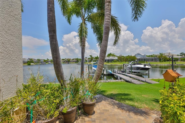 5417 Tybee Island Dr, Apollo Beach, FL 33572 - view of patio with a dock, boat lift, and a water view
