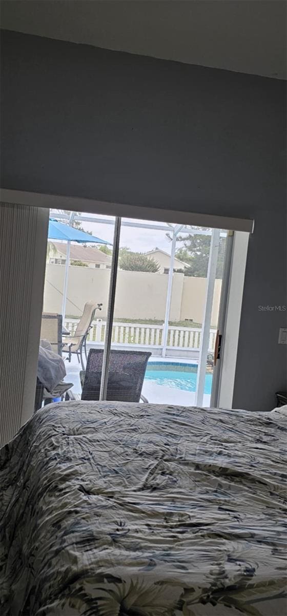4500 Onorio St, New Port Richey, FL 34653 - bedroom with access to exterior