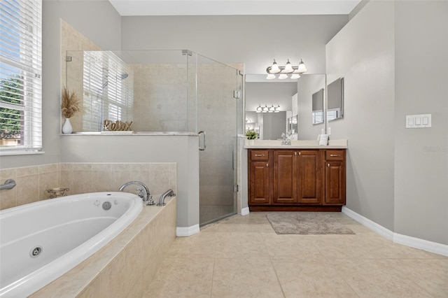 111 Falling Water Dr, Brandon, FL 33511 - full bathroom featuring vanity, a whirlpool tub, a shower stall, and tile patterned flooring