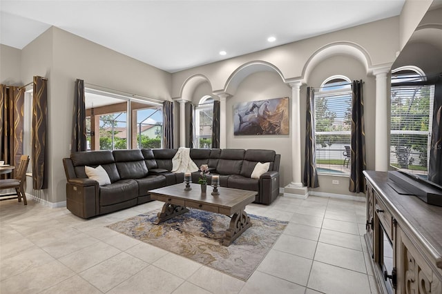 111 Falling Water Dr, Brandon, FL 33511 - living area featuring ornate columns, plenty of natural light, recessed lighting, and light tile patterned floors