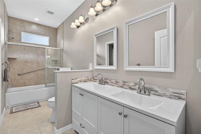 111 Falling Water Dr, Brandon, FL 33511 - full bath with double vanity, combined bath / shower with glass door, and tile patterned floors