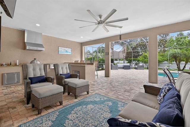 111 Falling Water Dr, Brandon, FL 33511 - living room with a ceiling fan, plenty of natural light, recessed lighting, and a textured wall
