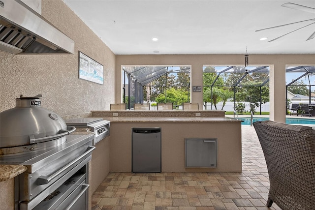 111 Falling Water Dr, Brandon, FL 33511 - view of patio / terrace featuring an outdoor kitchen and a lanai