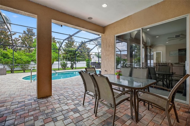 111 Falling Water Dr, Brandon, FL 33511 - sunroom featuring a pool and a ceiling fan