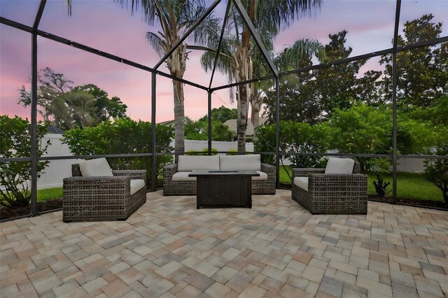 111 Falling Water Dr, Brandon, FL 33511 - patio terrace at dusk with a patio area, outdoor lounge area, and glass enclosure
