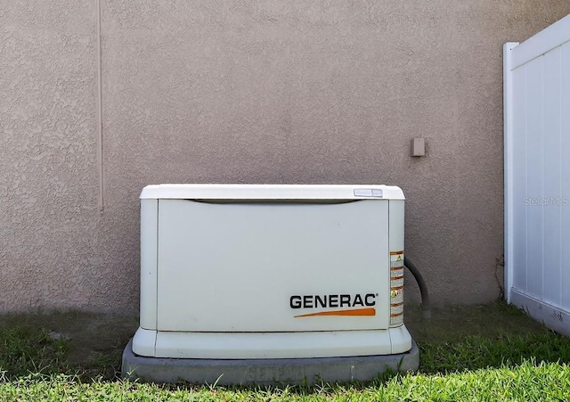 111 Falling Water Dr, Brandon, FL 33511 - exterior view of a power unit and stucco siding