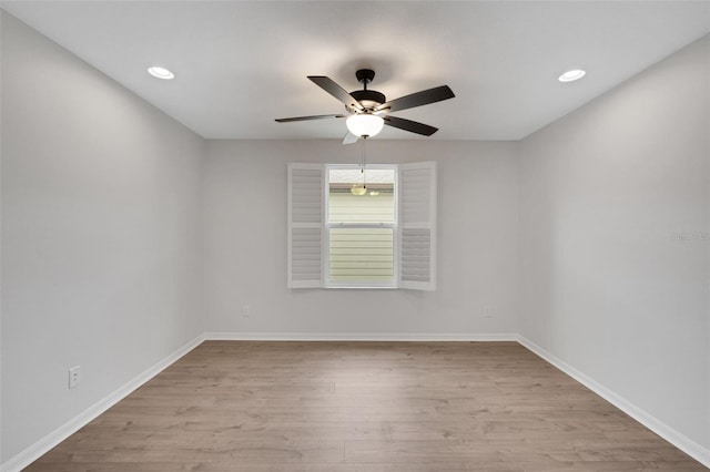 19238 Old Spanish Rd, Tampa, FL 33647 - empty room featuring a ceiling fan, wood finished floors, baseboards, and recessed lighting