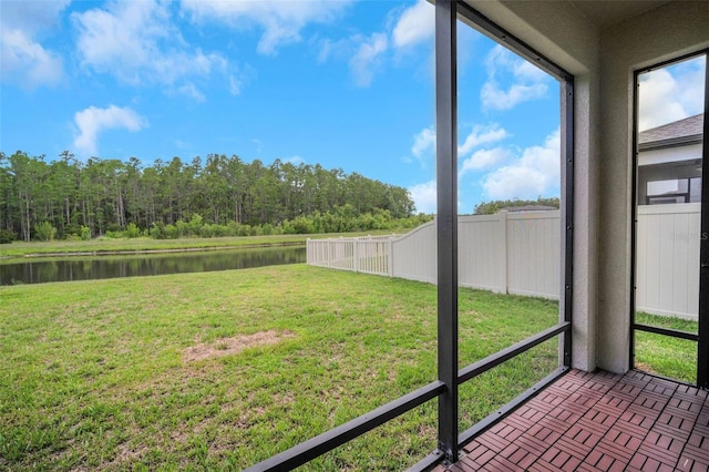 19238 Old Spanish Rd, Tampa, FL 33647 - unfurnished sunroom featuring a water view