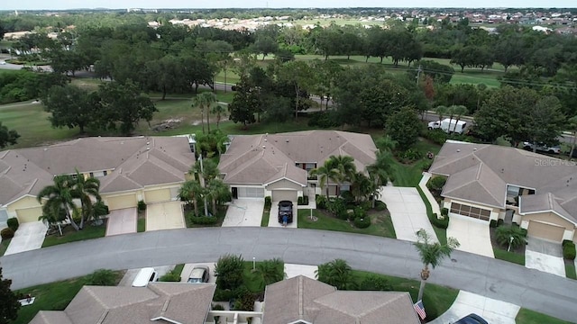 611 Tremont Greens Ln, Sun City Center, FL 33573 - aerial view of property and surrounding area with nearby suburban area