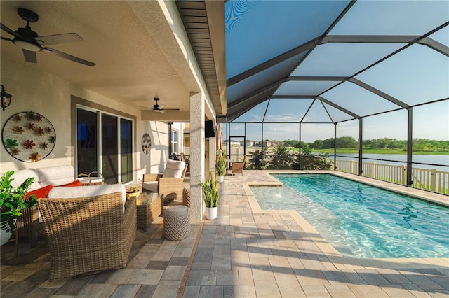 3091 King Fern Dr, Wimauma, FL 33598 - swimming pool featuring a ceiling fan, a patio, and a water view
