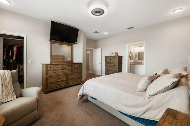 3091 King Fern Dr, Wimauma, FL 33598 - bedroom with a spacious closet, carpet, a closet, and connected bathroom