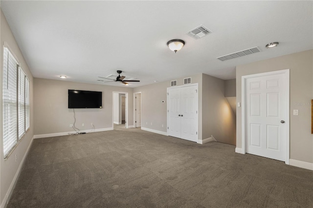 3091 King Fern Dr, Wimauma, FL 33598 - unfurnished living room with a ceiling fan, baseboards, and carpet