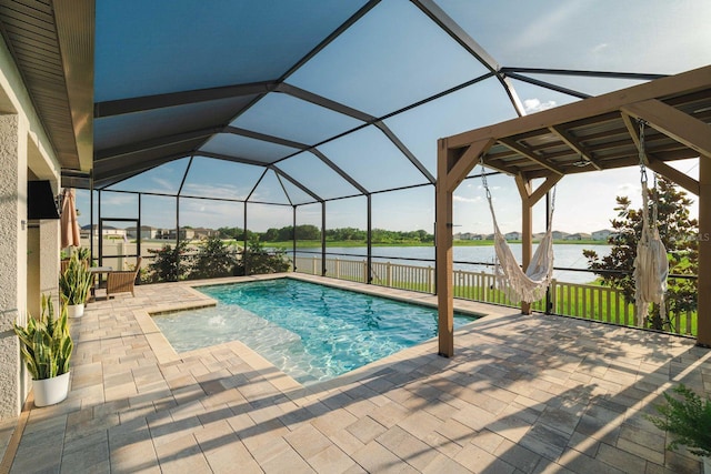 3091 King Fern Dr, Wimauma, FL 33598 - swimming pool featuring a water view, a patio area, and glass enclosure