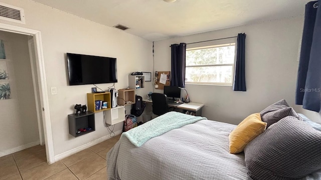 3225 Johnson St, Hollywood, FL 33021 - bedroom with light tile patterned floors, baseboards, and an office area