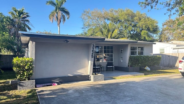 3225 Johnson St, Hollywood, FL 33021 - view of front of house with stucco siding