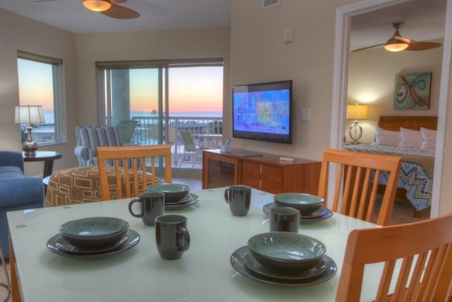 11605 Gulf Blvd Unit 506, Saint Petersburg, FL 33706 - dining space with ceiling fan