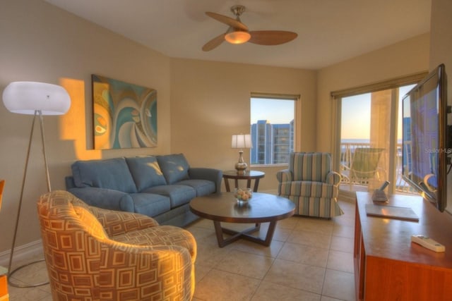 11605 Gulf Blvd Unit 506, Saint Petersburg, FL 33706 - living room featuring ceiling fan and light tile patterned floors