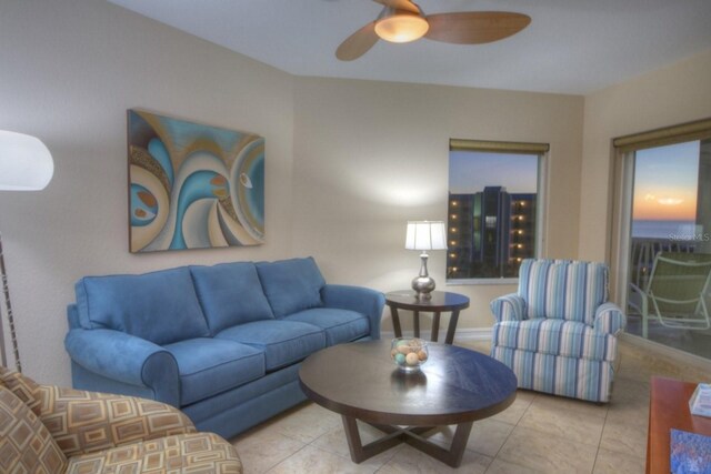 11605 Gulf Blvd Unit 506, Saint Petersburg, FL 33706 - tiled living area featuring ceiling fan and baseboards