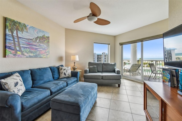 11605 Gulf Blvd Unit 506, Saint Petersburg, FL 33706 - living area with ceiling fan and light tile patterned floors