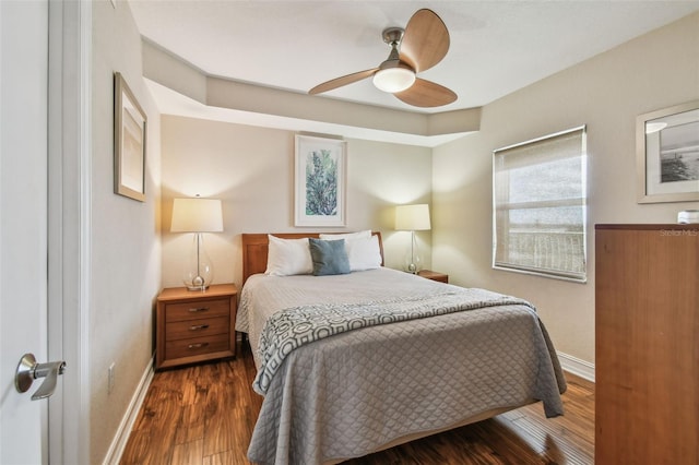 11605 Gulf Blvd Unit 506, Saint Petersburg, FL 33706 - bedroom featuring baseboards, dark wood-style flooring, and ceiling fan
