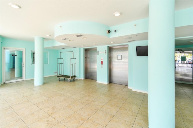 11605 Gulf Blvd Unit 506, Saint Petersburg, FL 33706 - building lobby featuring recessed lighting and a security system
