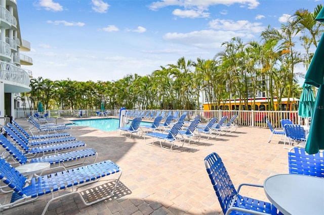 11605 Gulf Blvd Unit 506, Saint Petersburg, FL 33706 - community pool with a patio area