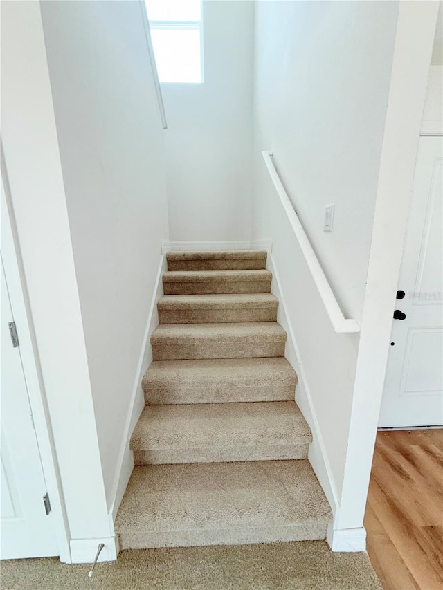 222 Carpenters Way Unit 71, Lakeland, FL 33805 - stairs featuring baseboards