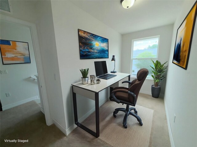 222 Carpenters Way Unit 71, Lakeland, FL 33805 - office area featuring light colored carpet and baseboards