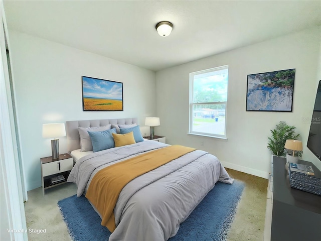 222 Carpenters Way Unit 71, Lakeland, FL 33805 - bedroom with light colored carpet and baseboards