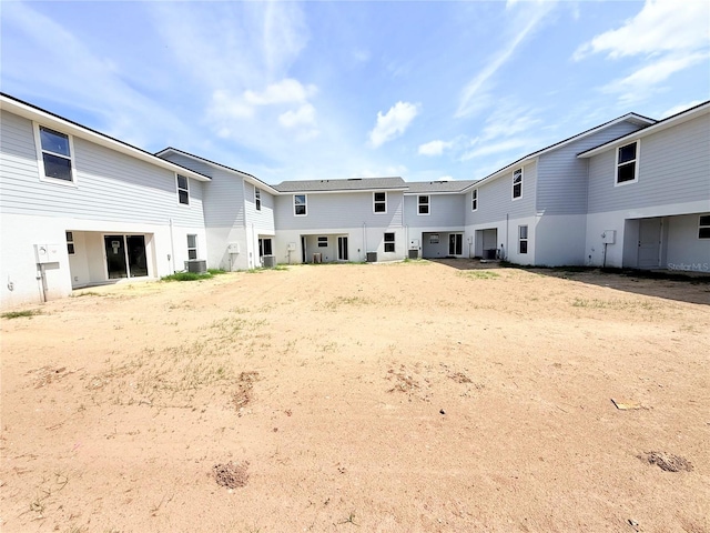 222 Carpenters Way Unit 71, Lakeland, FL 33805 - rear view of house with central AC