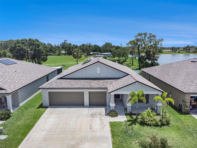 146 Rain Berry Ave, Ruskin, FL 33570 - single story home with an attached garage, driveway, a front lawn, and a shingled roof