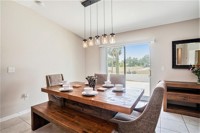146 Rain Berry Ave, Ruskin, FL 33570 - dining area featuring light tile patterned flooring and baseboards
