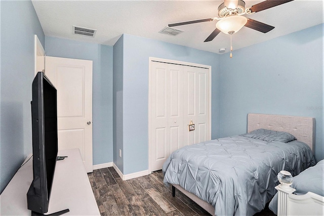 146 Rain Berry Ave, Ruskin, FL 33570 - bedroom with wood finished floors, a closet, and ceiling fan