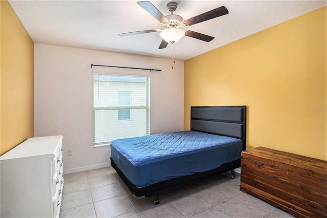 146 Rain Berry Ave, Ruskin, FL 33570 - bedroom featuring light tile patterned flooring and a ceiling fan