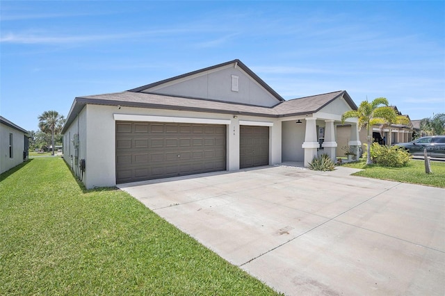 146 Rain Berry Ave, Ruskin, FL 33570 - view of front facade featuring driveway, a front lawn, a garage, and stucco siding