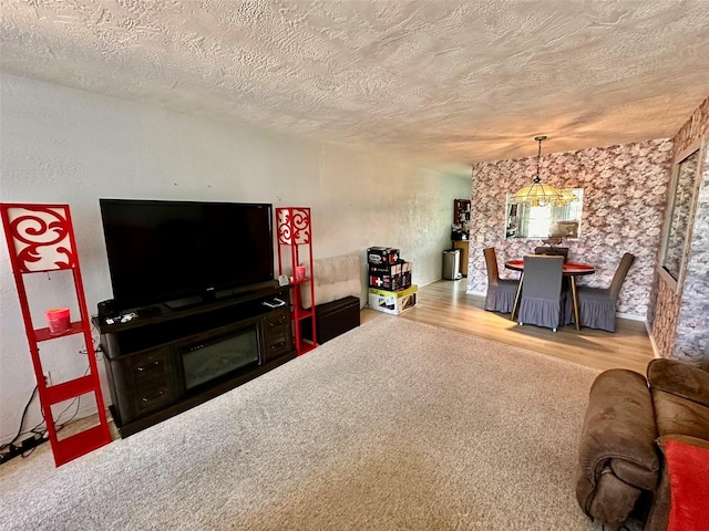 2434 Australia Way E Unit 38, Clearwater, FL 33763 - living area featuring a textured ceiling and wood finished floors
