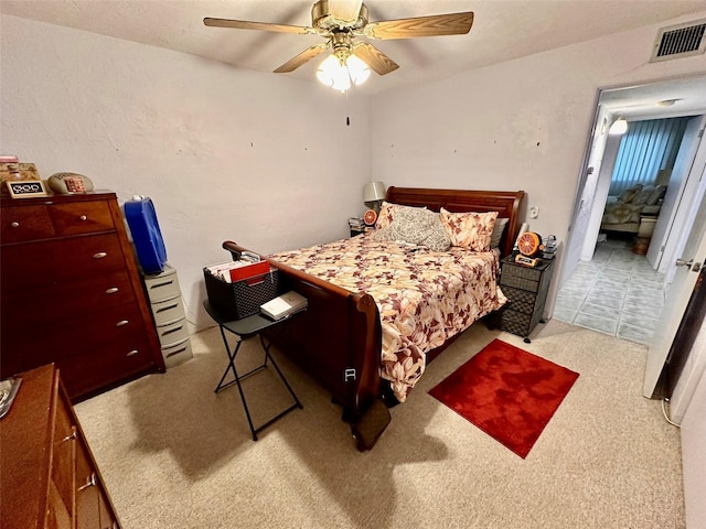 2434 Australia Way E Unit 38, Clearwater, FL 33763 - bedroom featuring ceiling fan and carpet