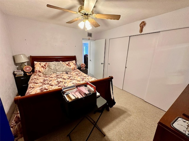 2434 Australia Way E Unit 38, Clearwater, FL 33763 - carpeted bedroom featuring a closet and ceiling fan