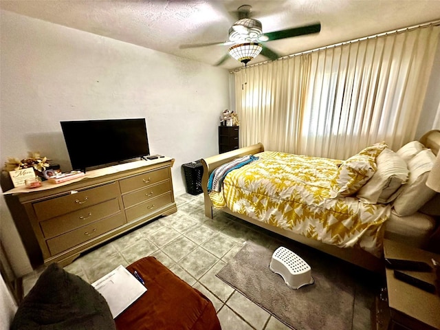 2434 Australia Way E Unit 38, Clearwater, FL 33763 - bedroom featuring light tile patterned floors and a ceiling fan
