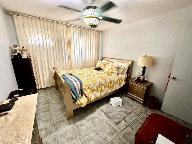2434 Australia Way E Unit 38, Clearwater, FL 33763 - bedroom with tile patterned flooring and ceiling fan