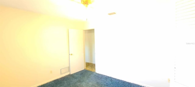 3717 Mckay Creek Dr, Largo, FL 33770 - empty room with dark colored carpet