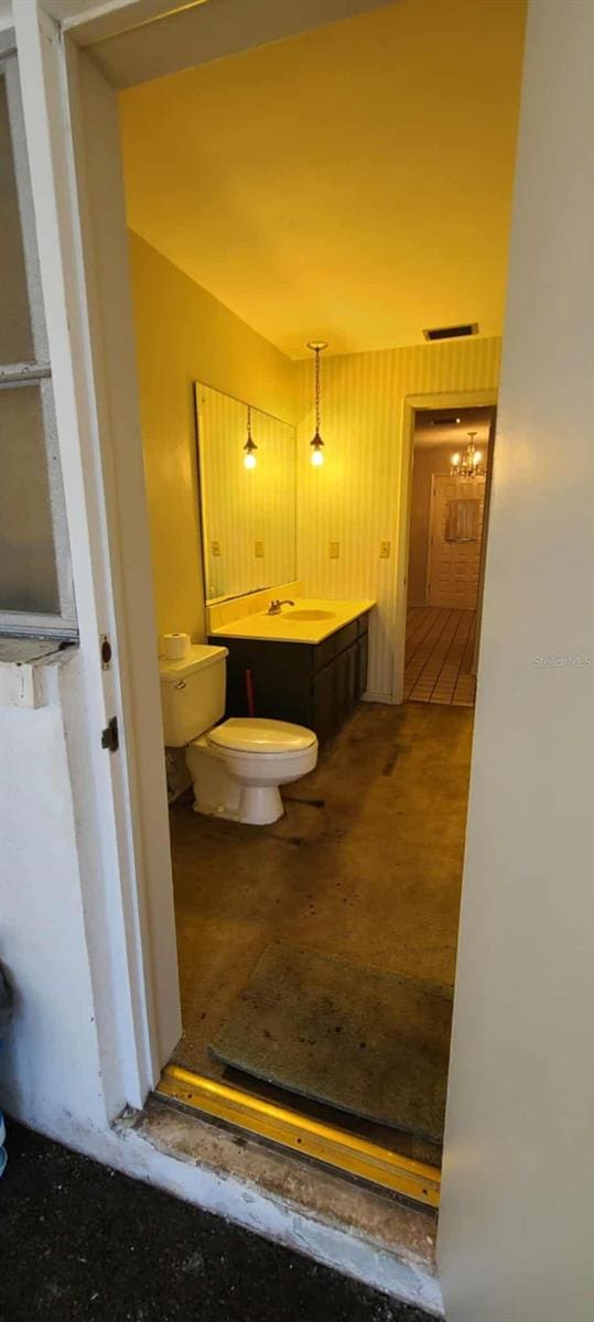 3717 Mckay Creek Dr, Largo, FL 33770 - bathroom featuring toilet and a sink