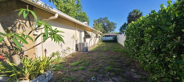 3717 Mckay Creek Dr, Largo, FL 33770 - fenced backyard with central AC unit